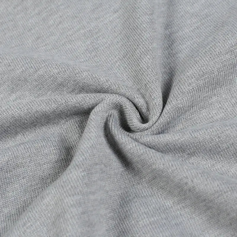 Sweater vest gray knitted fabric close-up texture with soft feel