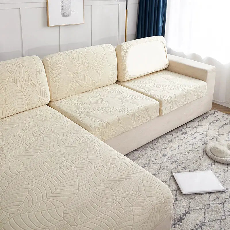 Waterproof stretch sofa slipcover in beige leaf-pattern, Simples Market couch protector.