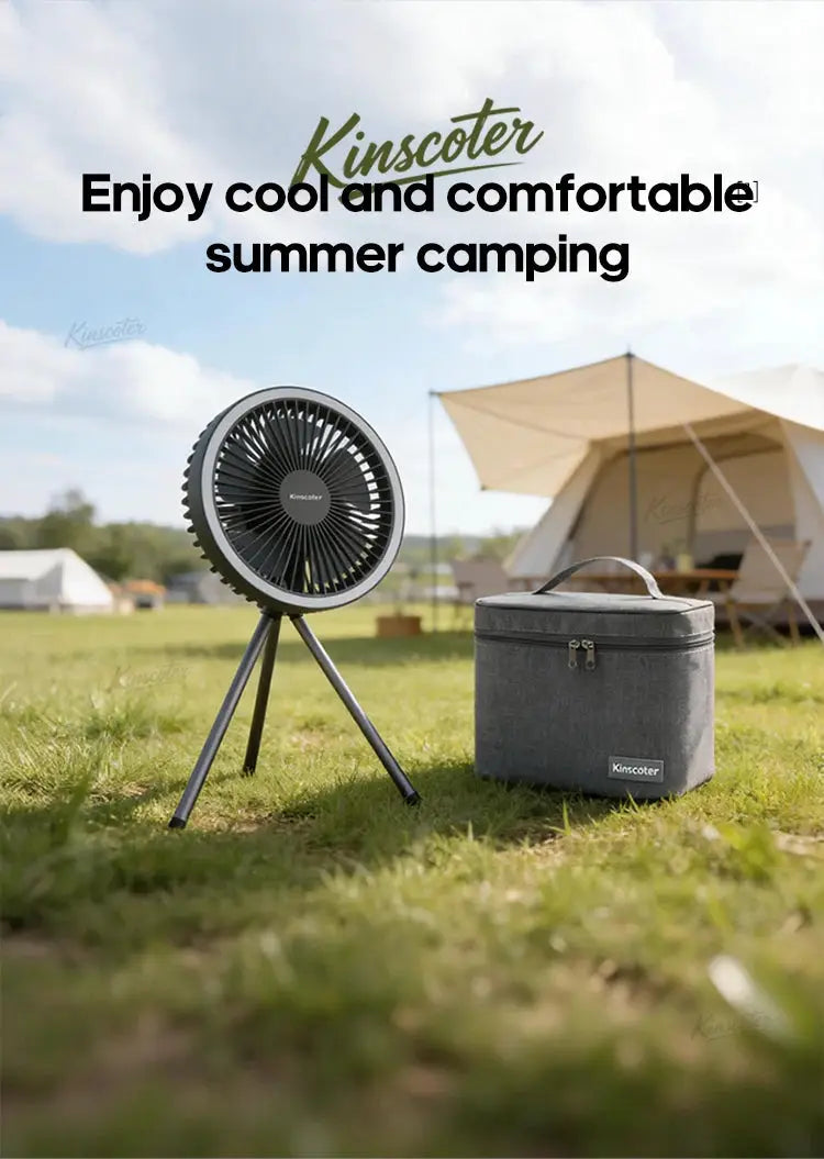 Kinscoter camping fan on a tripod with gray carrying case in an outdoor camping scene