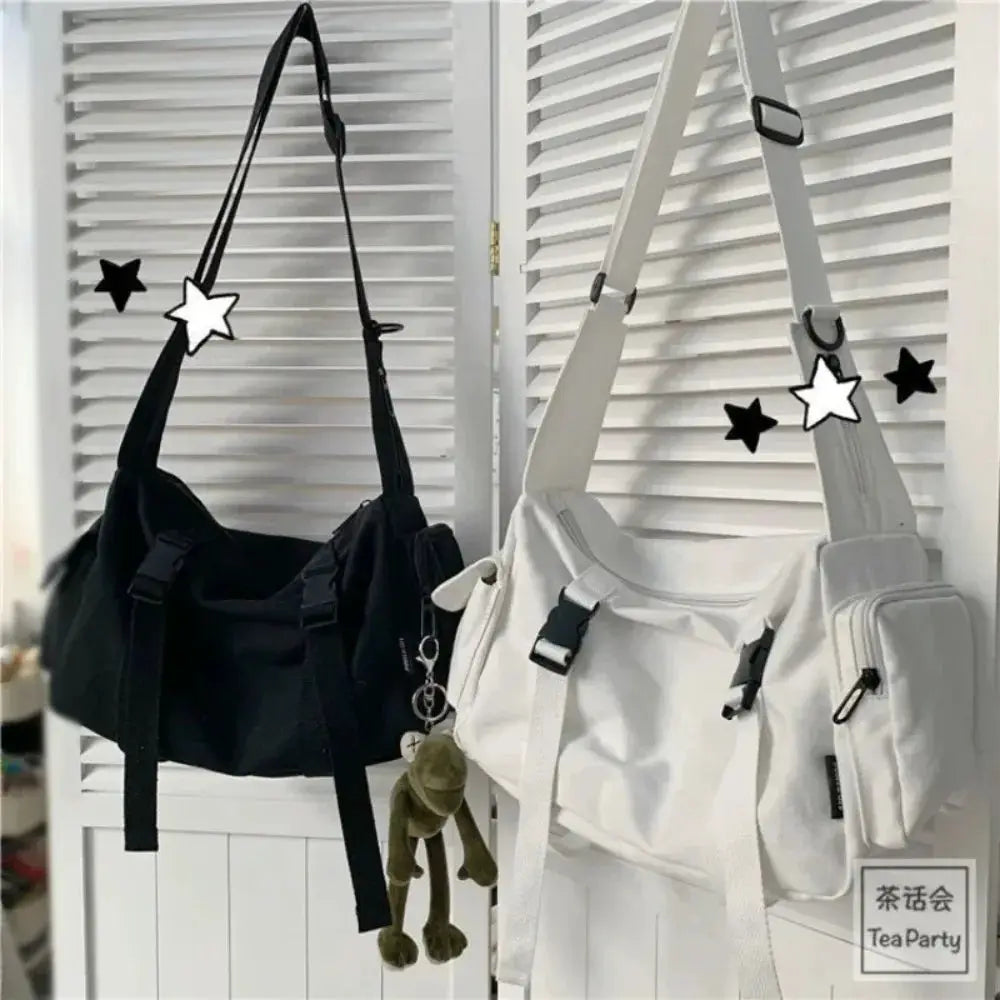 Two canvas crossbody bags in black and white by Simples Market; large-capacity shoulder bags