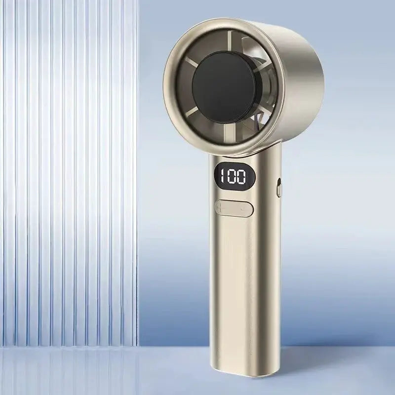 Handheld mini fan with a gold metal body, circular head, and a digital display on the handle.