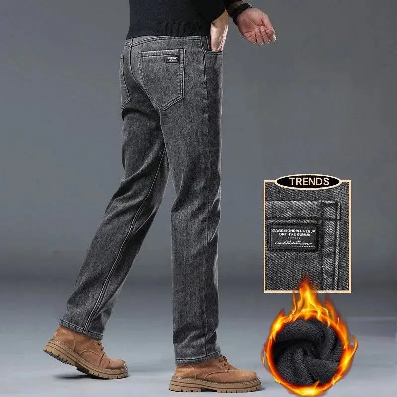 Men's winter warm jeans in gray denim, slim straight fit with plush lining and back pocket patch.