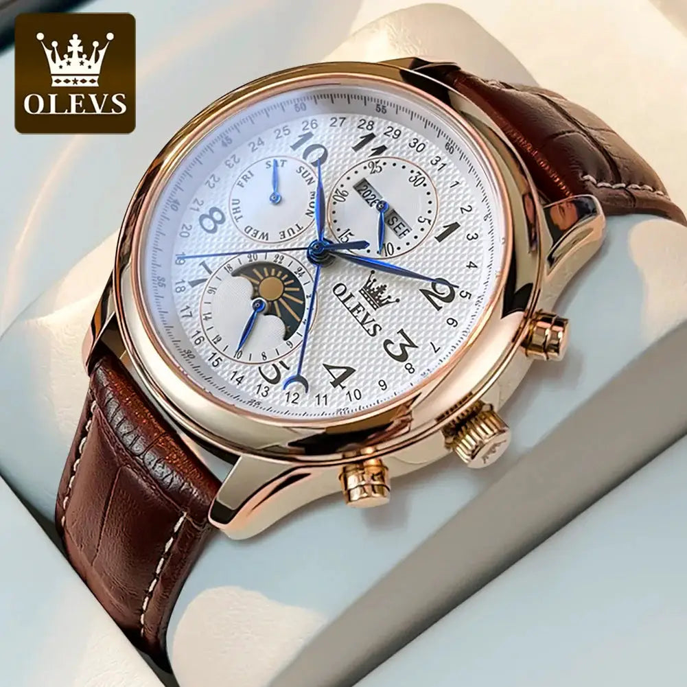 OLEVS men's luxury watch with gold-tone case, brown leather strap, white dial and blue hands with moonphase subdial.