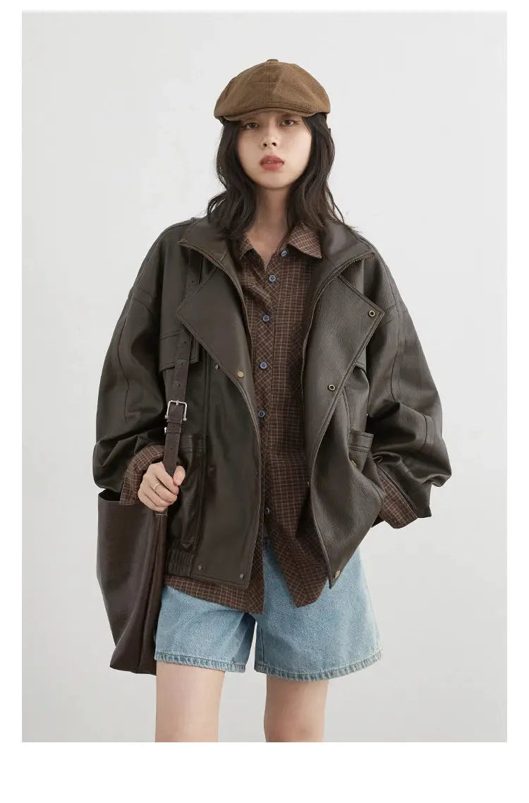 CHIC VEN women's shirt in brown plaid, styled with an oversized brown jacket, denim shorts, and cap
