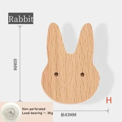 Bunny-shaped wooden wall hook for children's room, natural wood finish.