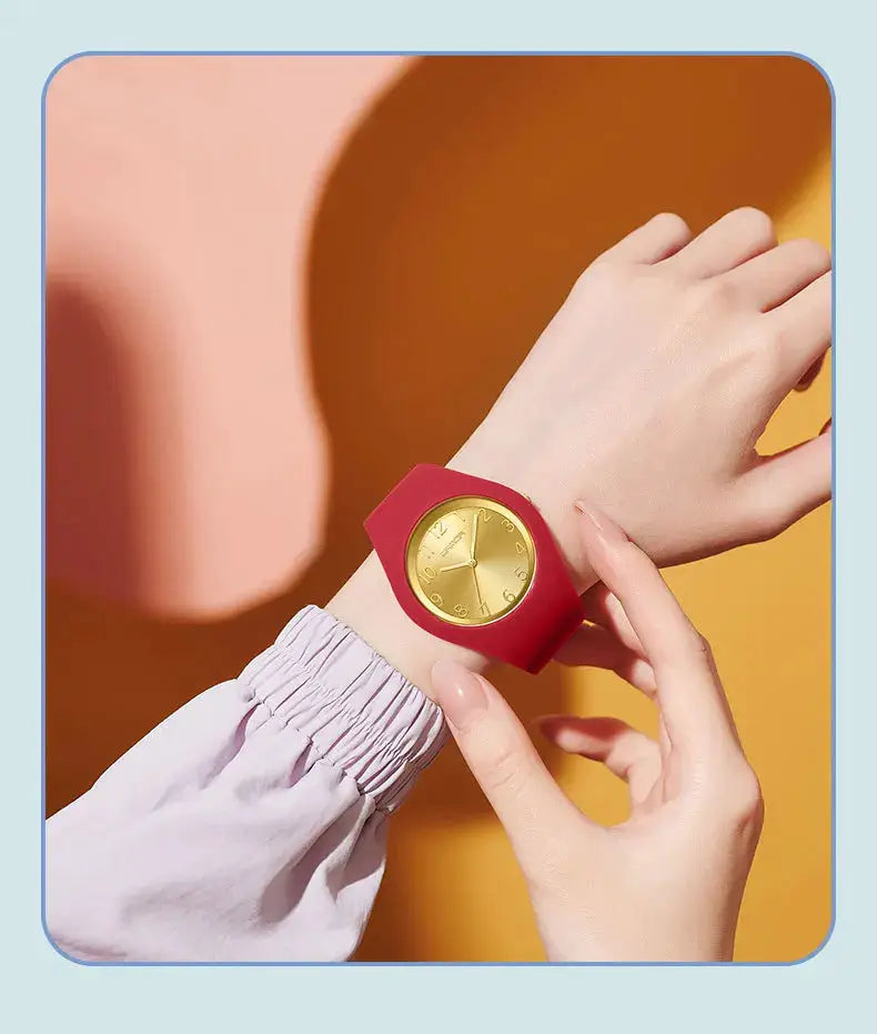 SANDA 6186 silicone wristwatch with red strap and gold dial from Simples Market.