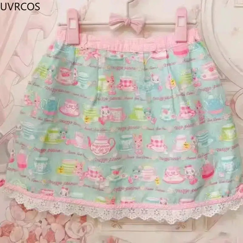 Sweet Lolita cake print mini skirt pastel blue with pink waistband and white lace hem