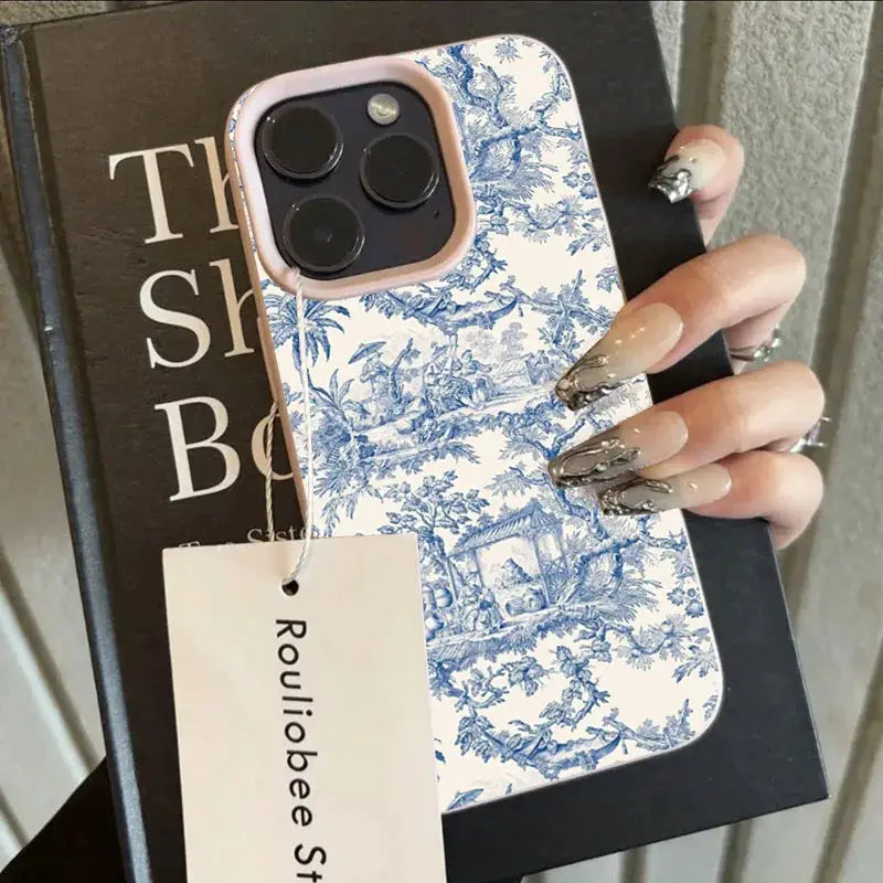 Phone case Simples Market with blue toile pattern on white, pink edge, shockproof soft cover for iPhone.