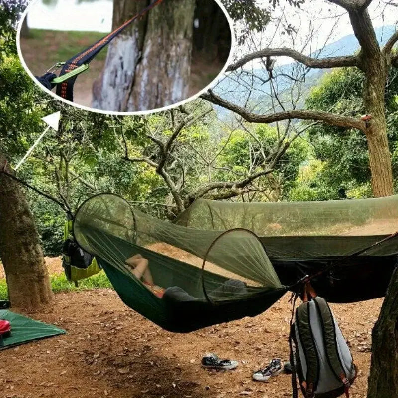 2-piece set of reinforced polyester hammock straps with 5 rings securing a green camping hammock between trees