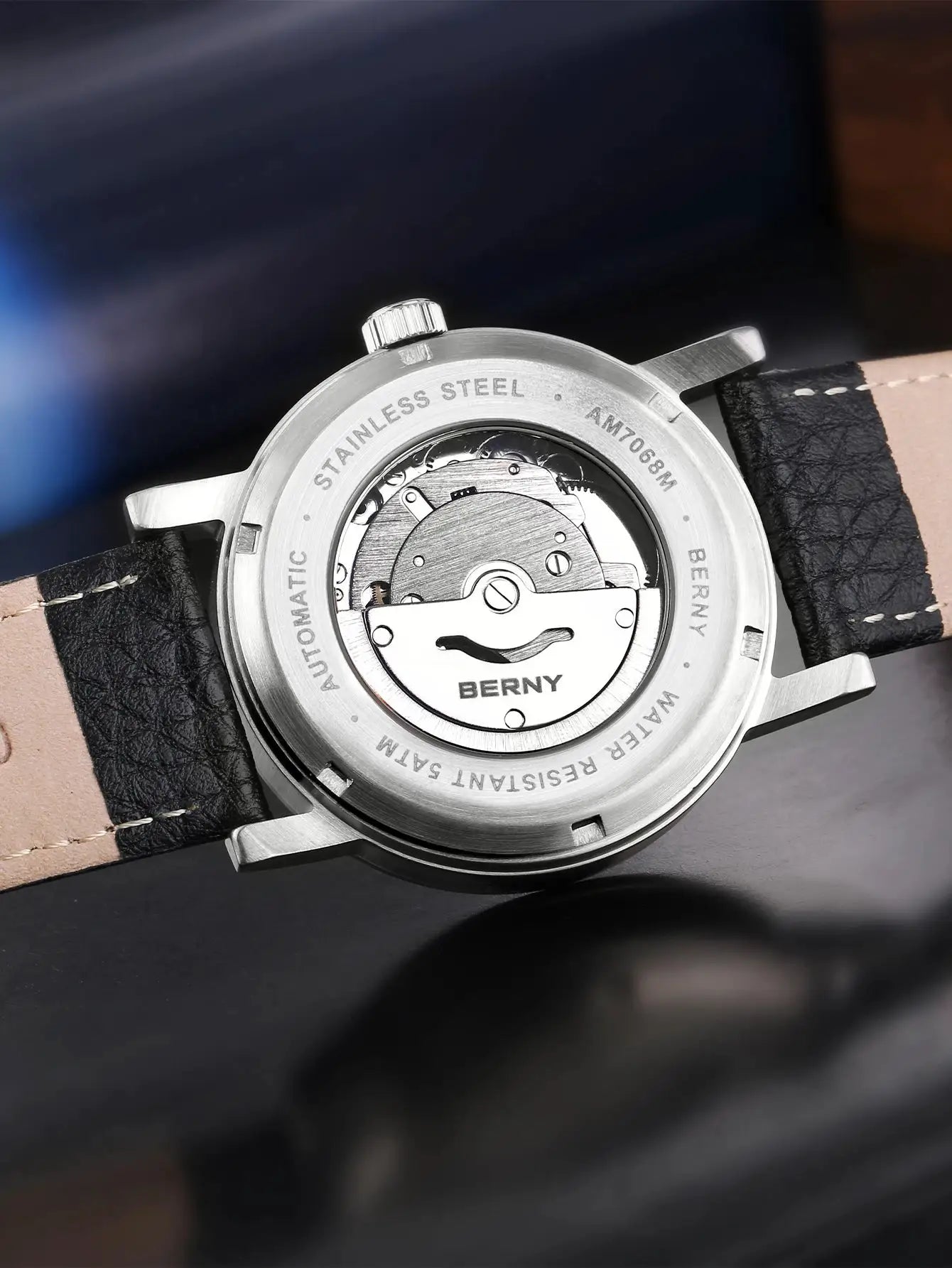 BERNY men's wristwatch with automatic movement, stainless steel case, transparent back, black leather strap