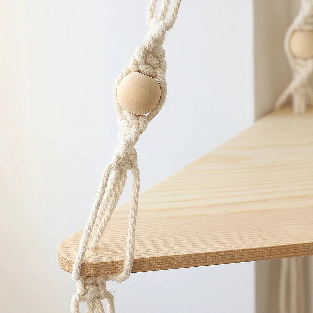 Floating wooden wall shelf with natural finish and rope hanger with bead, boho decor