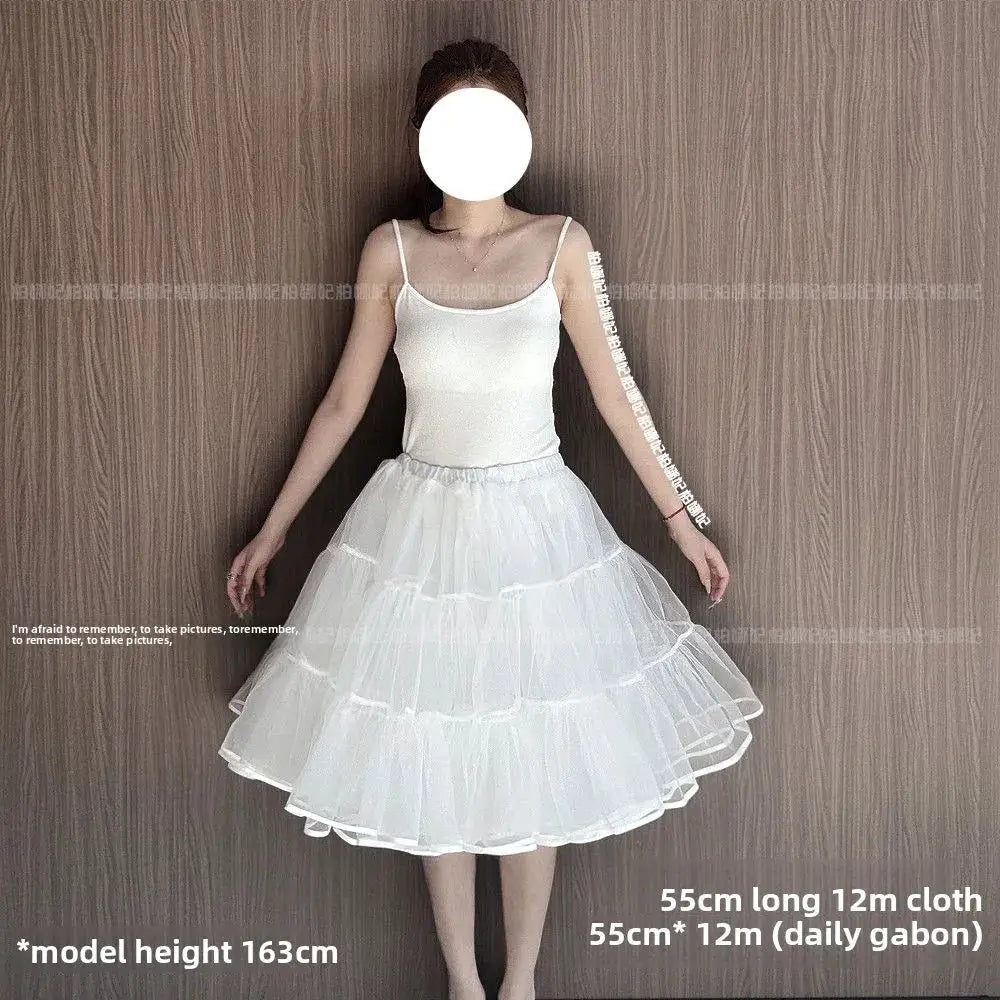 Lolita petticoat underskirt 35cm by Simples Market; white fluffy tiered mesh crinoline worn by model