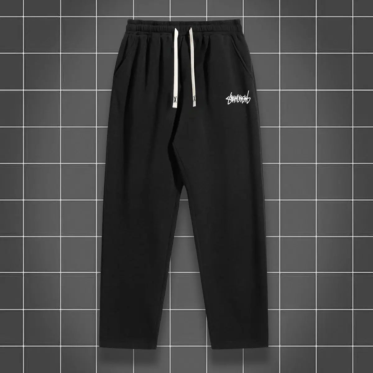 Men's black solid-color straight-leg jogging pants by Simples Market with white drawstring and front logo