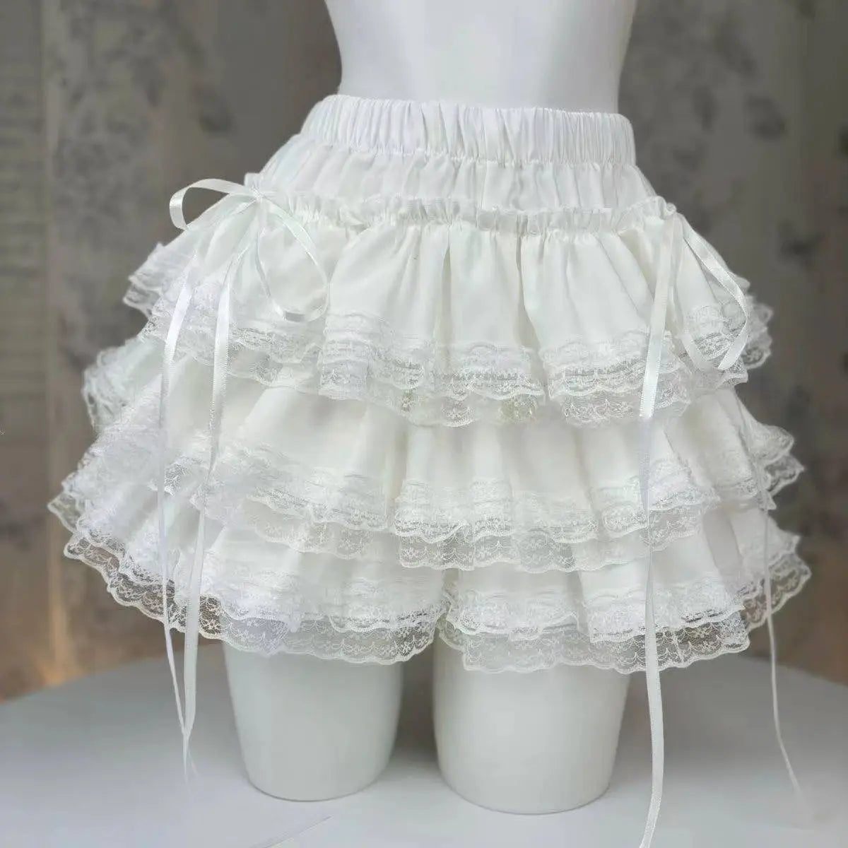 Lolita style princess cake skirt, white lace-tiered with satin bows