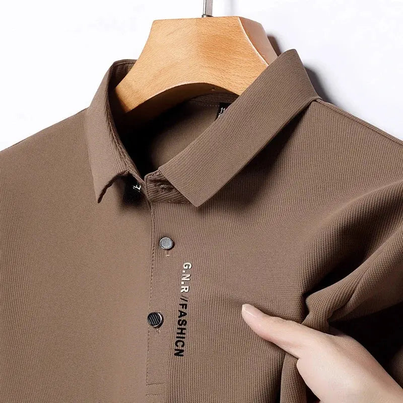 Brown solid-color men's short-sleeve polo with G.NR FASHION logo on placket