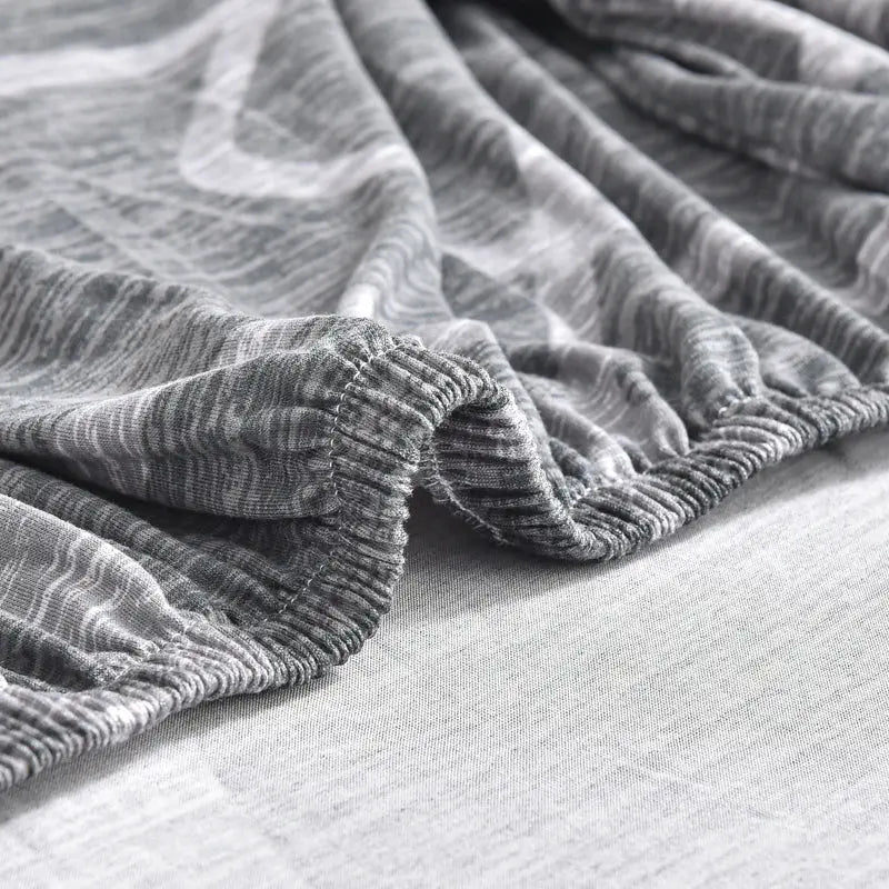 Stretch couch cushion slipcovers in grey with elastic anti-slip edges for sofa cushions