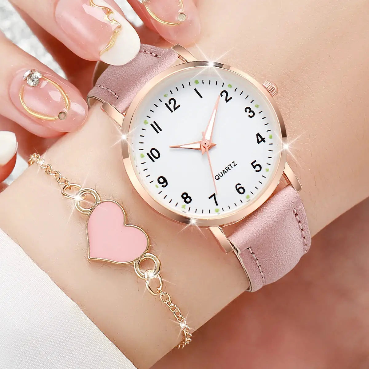 Women's rose-gold quartz watch with pink leather strap plus matching pink heart bracelet, 2-piece set