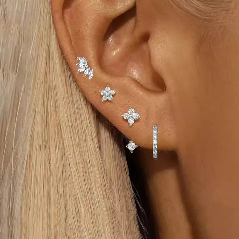 Simples Market 4Pcs silver-tone zircon earring set with flower, star, leaf studs and a small hoop