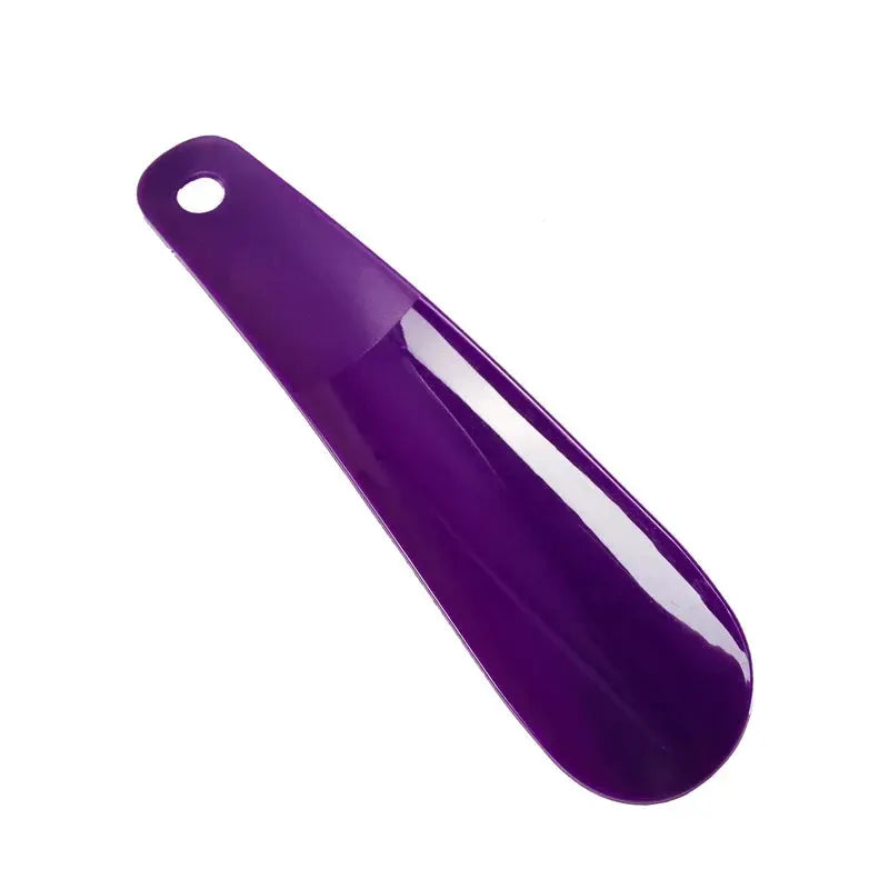 Purple plastic short-handle shoe horn, 16 cm, portable home-use accessory.