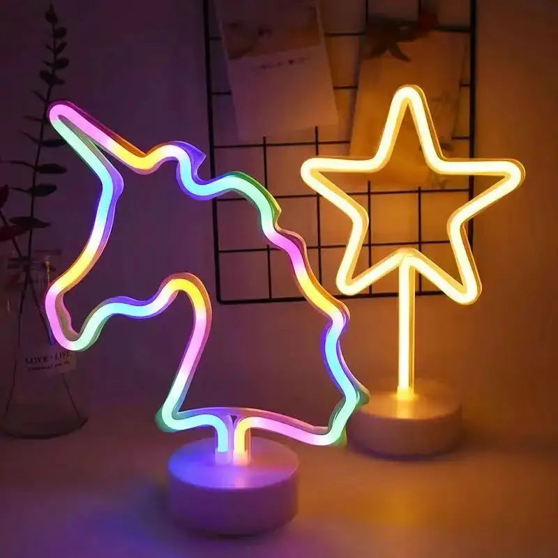 Two USB neon LED signs: multicolor unicorn outline and bright yellow star on white bases