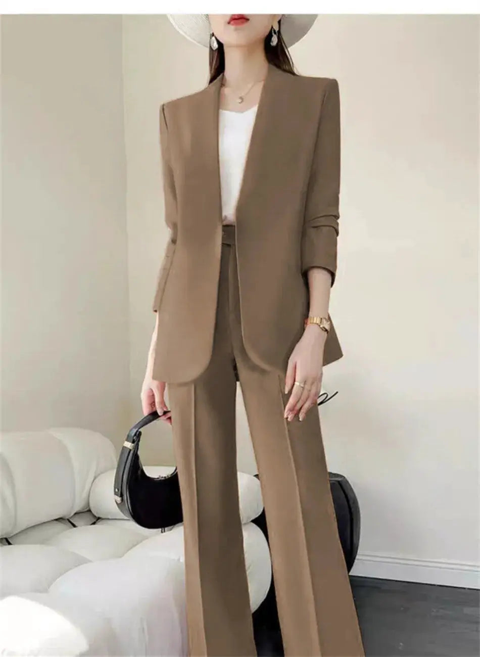 Women's brown-taupe 2-piece suit set with blazer and wide-leg trousers, white top for an elegant office look.