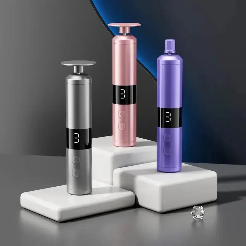 USB charging foot grinder and nail grinder 3‑piece set in silver, pink, and purple on white pedestals