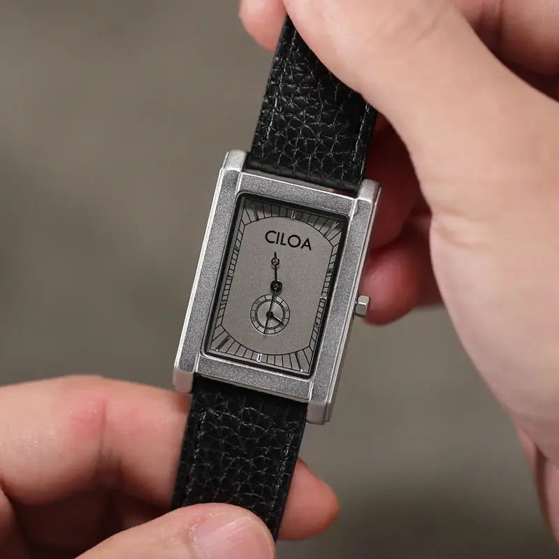 CILOA square quartz watch with black leather strap and silver case