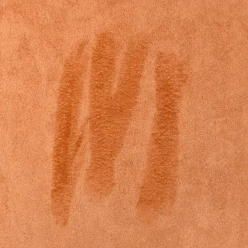 Synthetic leather suede fabric with self-adhesive back for car interiors by Simples Market in orange-brown.