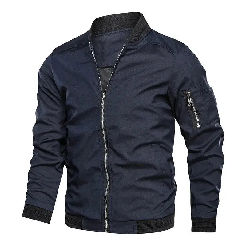 Men's navy windbreaker jacket with zip front, ribbed cuffs and hem, and zip sleeve pocket