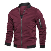 Simples Market men's burgundy windbreaker with zip front, ribbed cuffs/hem, and zip sleeve pocket