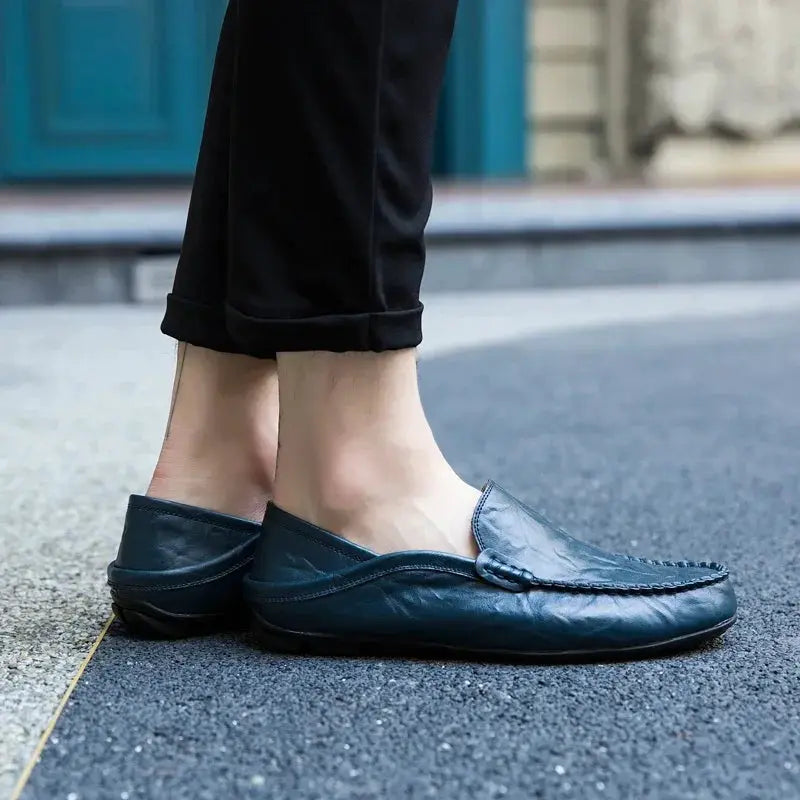 Men's navy blue genuine leather loafers by Simples Market; slip-on moccasins for casual wear (pair shown)