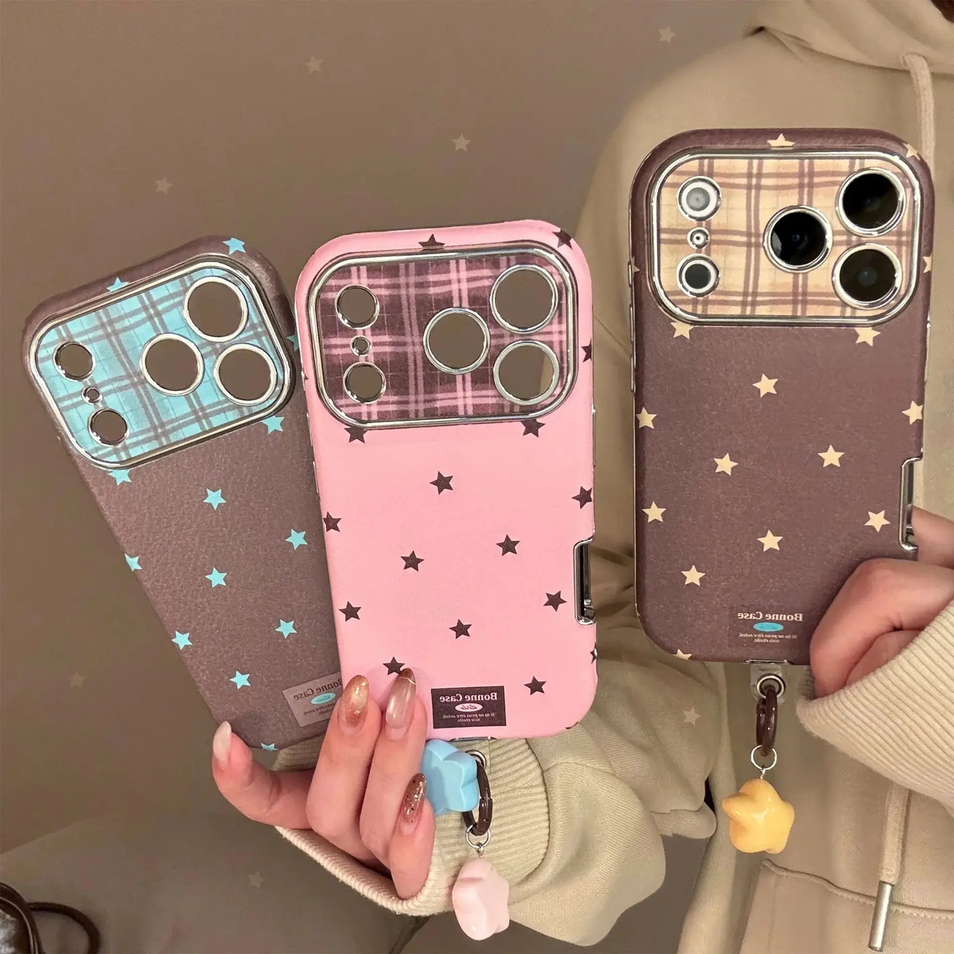 Simples Market Korean Retro Stars plaid leather texture iPhone case trio with pendant in blue, pink, and brown