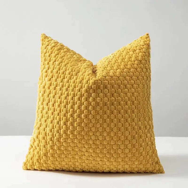Soft velvet cushion cover, yellow with a textured dot pattern