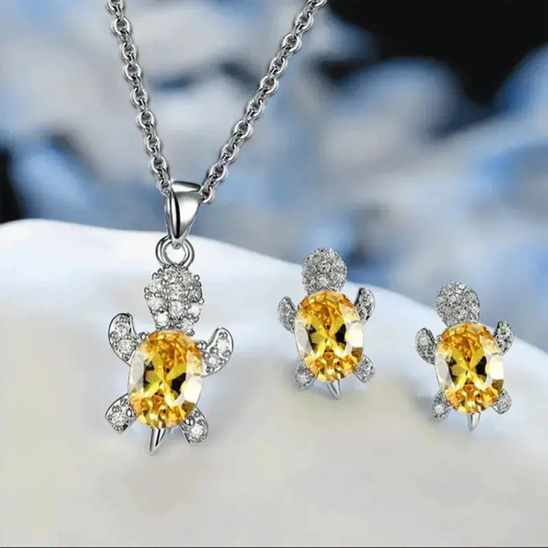 3pc turtle jewelry set: silver-plated necklace and earrings with yellow glass stones and clear crystals