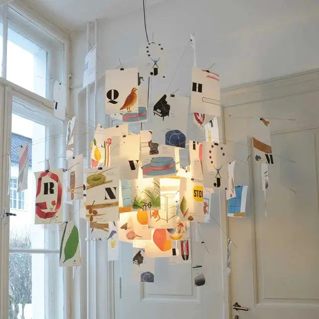 Ingo Maurer colored paper chandelier replica with LED E27 bulb by Simples Market, hanging multi-panel paper lampshade.