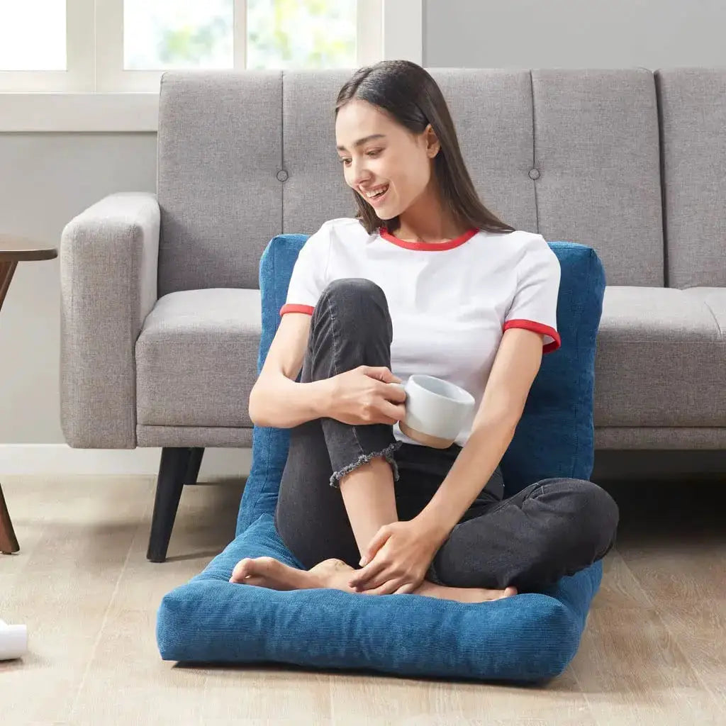 Blue square floor pillow seating cushion for meditation and yoga, thick tufted cushion, ideal for balcony.