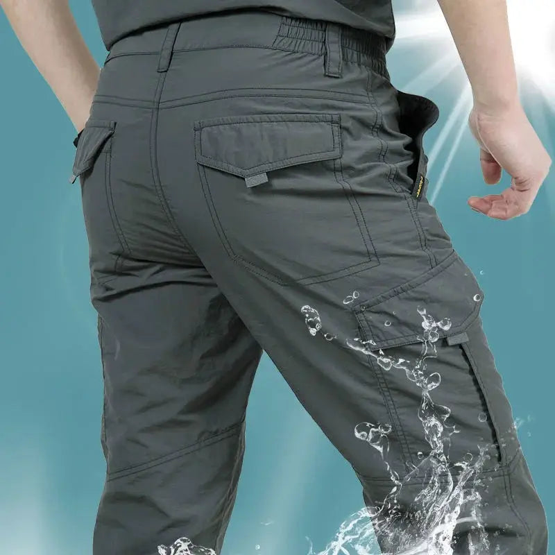 Men's outdoor waterproof tactical cargo pants in grey with quick-dry fabric and multiple pockets