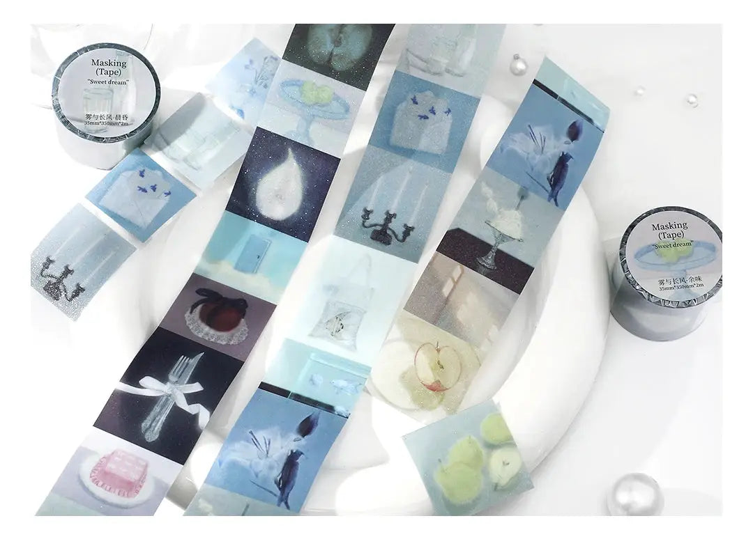 Two rolls of decorative PET masking tape by Simples Market, scenic print strips for journaling and scrapbooking.