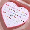 Resin stud earrings set in a pink heart-shaped display box, 36 pairs of colorful snowflake, cat, and butterfly designs