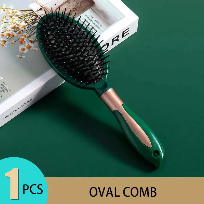 KLINA oval hair brush with green handle and rose-gold accent, black air-cushion bristles.