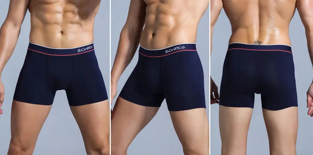 Boxer briefs for men in navy cotton with white waistband and red trim; front, side, back views.