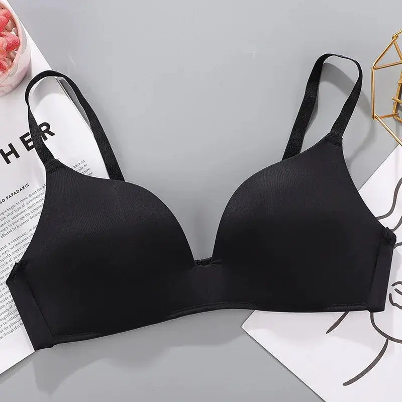 Women’s black seamless wireless bra with molded cups and adjustable straps