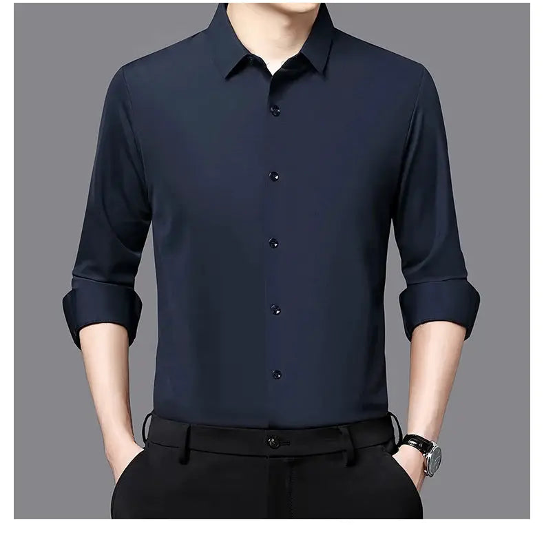Premium men's navy ultra-stretch shirt with rolled cuffs, long sleeves, button-down.