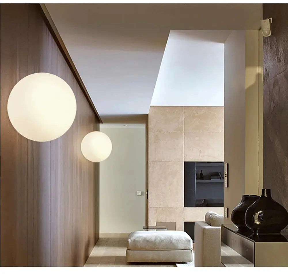 LED glass white ball ceiling light pair from Simples Market, minimalist spherical indoor fixtures.