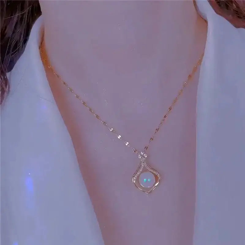 Beads women's Kpop pearl choker necklace, gold-tone with crystal pendant and iridescent center stone