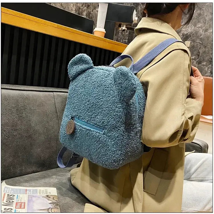 Small bear-ear fleece backpack for kids by Simples Market; blue plush daypack with front zipper pocket