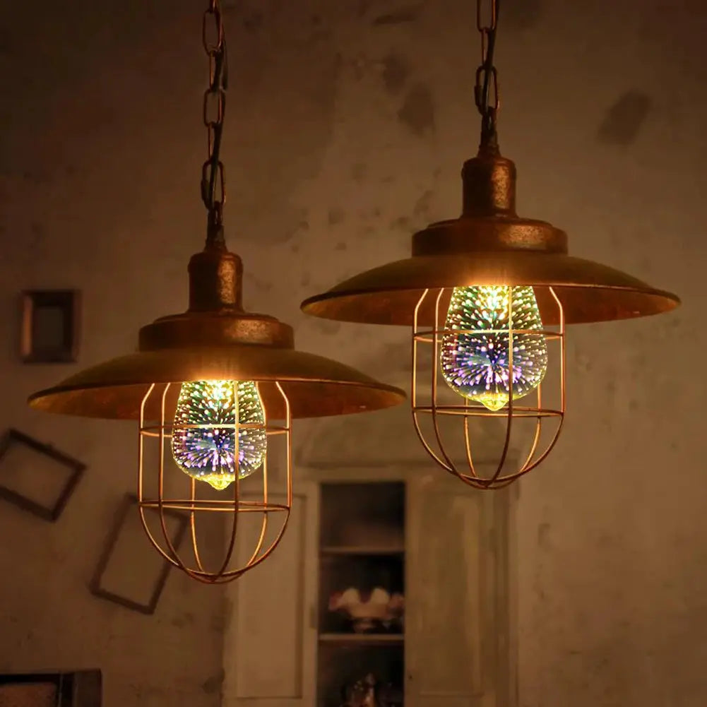 Two copper-finish E27 3D Night Light Star Fireworks pendant lamps with metal cage shade by Simples Market