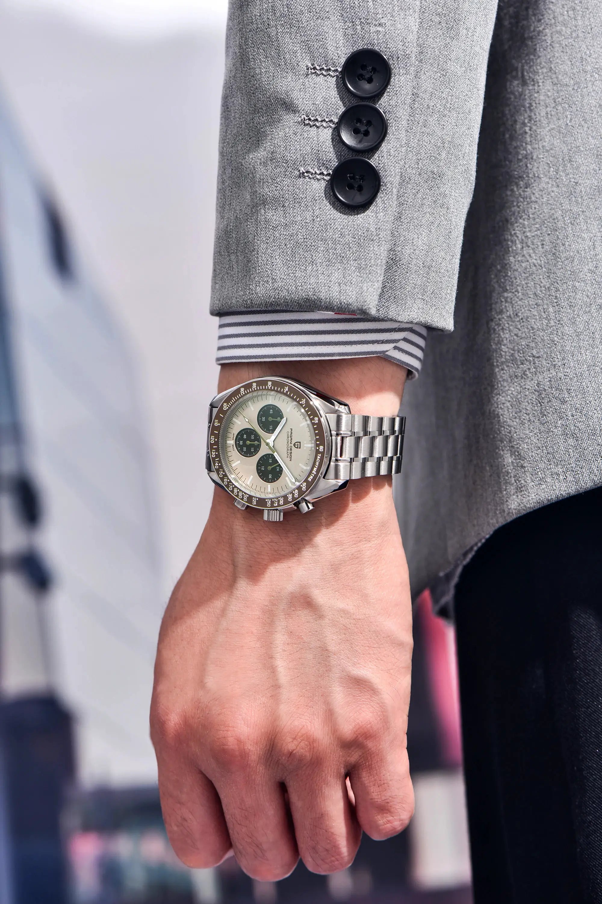 Pagani Design 500 Speedometer chronograph watch on stainless steel bracelet; beige dial with green subdials.