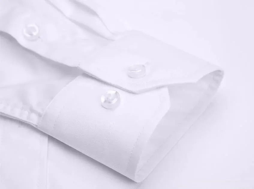 Men's formal white long-sleeve dress shirt by Simples Market; cuff with button detail for office wear.