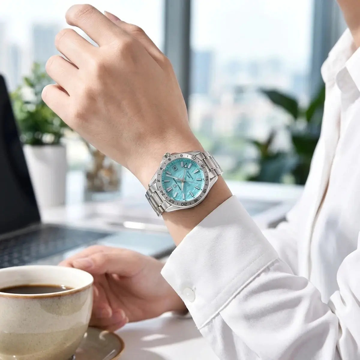 Pagani Design GMT men's stainless steel watch with turquoise dial and GMT bezel